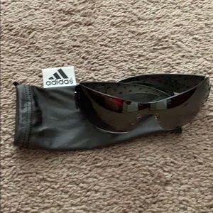 Paula Creamer Sundog sunglasses (adidas bag)
